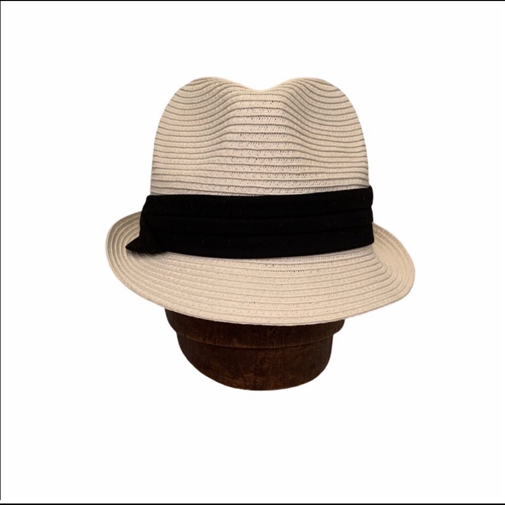White hat with black ribbon